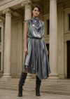 Model wearing the DaRousso Liquid Silver Metallic Dress in front of classical architectural columns.